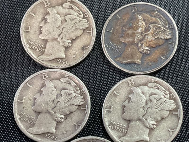 Coins and currency featured in the Yellow Gate Winter Wonderland Auction.