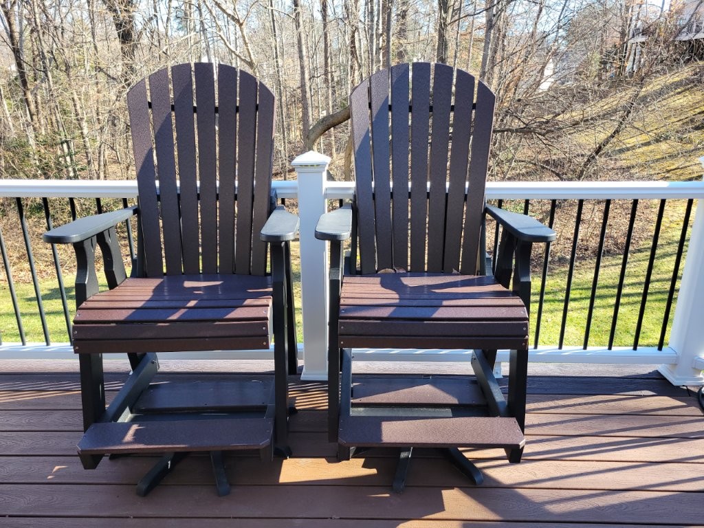 Pair of Woodcrafters Furniture & Cabinetry “Patio & Picnic Outdoor Furniture Collection” poly composite bar height Adirondack style swivel armchairs