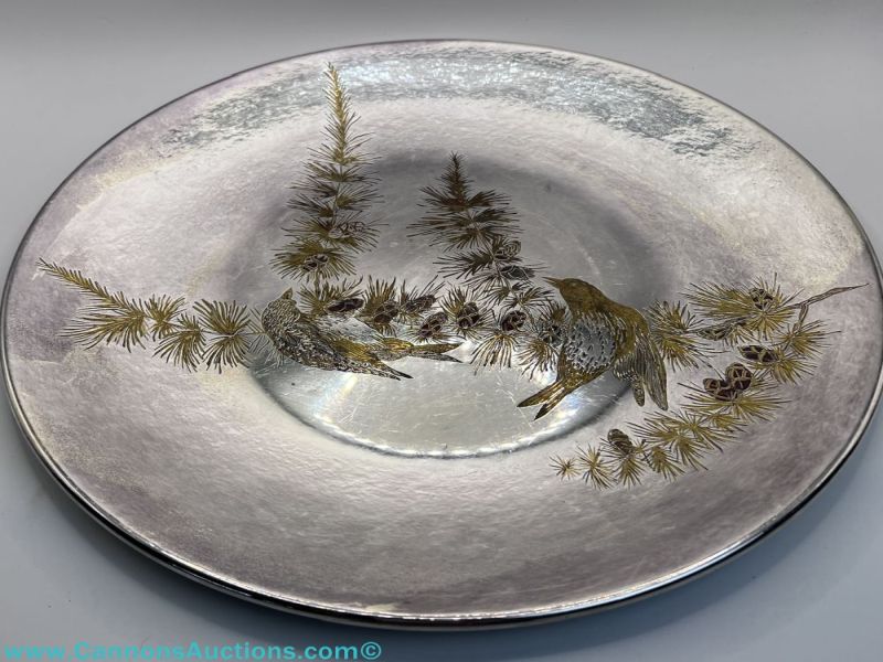 Reed & Barton Damascene silver-tone dish featuring two birds among pine boughs and pinecones.