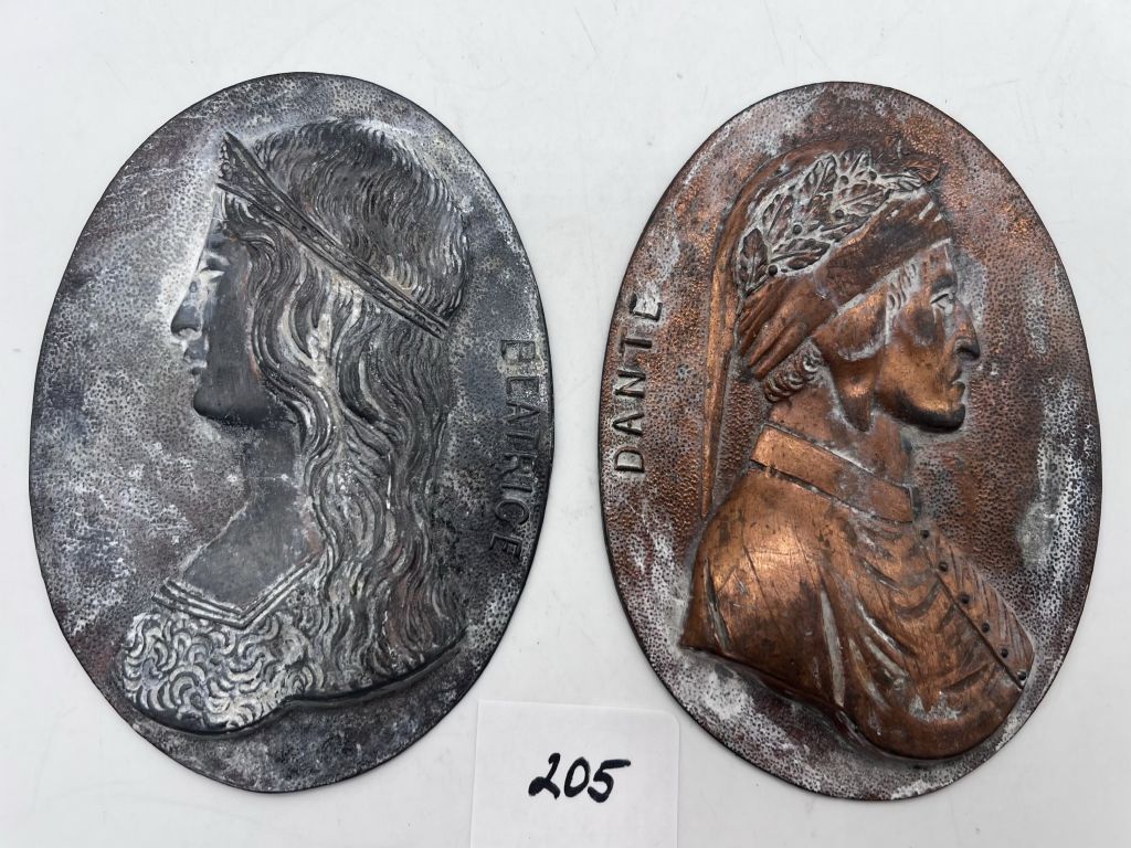 Two oval bronze or pewter portrait medallions showing Beatrice Portinari and Dante Alighieri in profile, each about 4.5 by 3.5 inches.