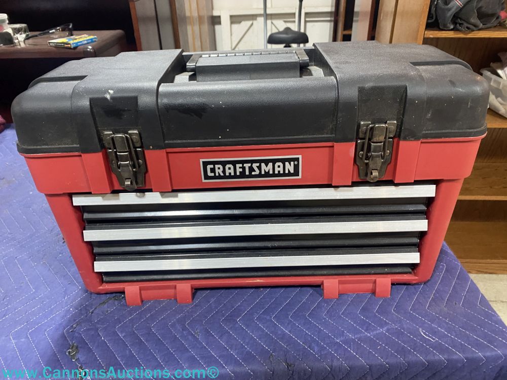 Craftsman mechanics tool set in red and black portable toolbox with top storage compartment and four pull-out drawers