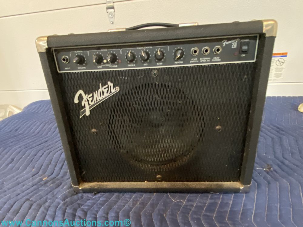 Fender Frontman 25R guitar amplifier combo with black cabinet, front speaker grille, control panel with gain, volume, treble, mid, bass, and reverb knobs