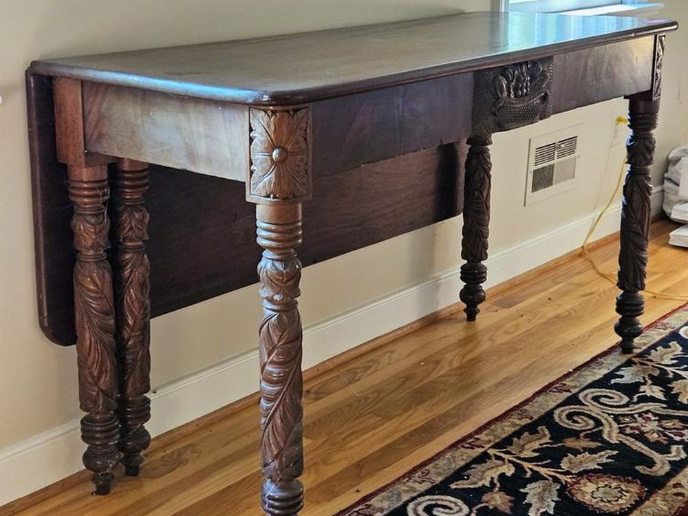 19thC American Empire mahogany gate leg table with carved floral and fruit motifs, turned legs, and drop leaves, 20 x 52 x 29 inches