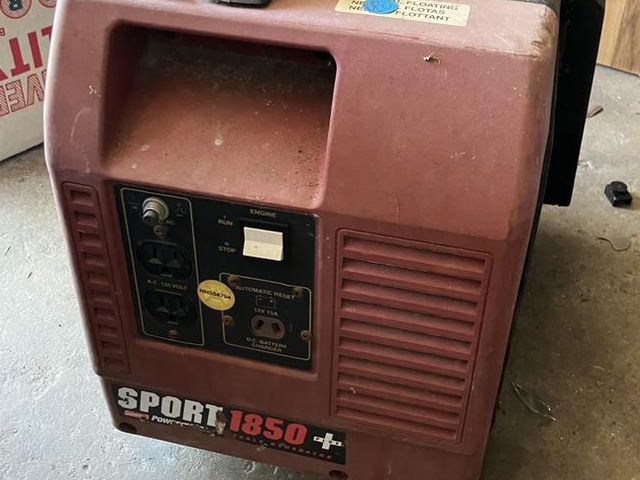 Coleman Sport 1850 portable generator with AC 120 volt outlets and automatic reset feature.