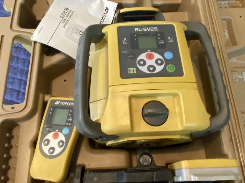Topcon RL-SV2 self-leveling dual grade laser kit with RC-60 remote and LS-80L receiver in carrying case