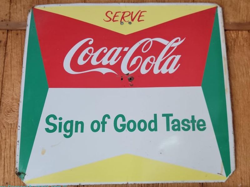 Vintage metal Coca-Cola “Sign of Good Taste” advertising sign, 15.5" x 16.5"