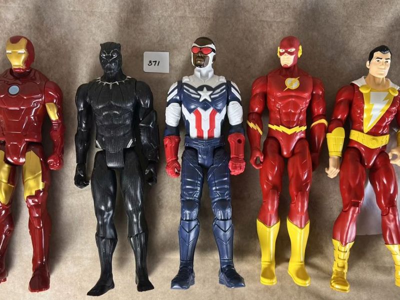 Hasbro Marvel Titan Hero Series 12-inch action figures, including Iron Man, Black Panther, Captain America, and The Flash-style and Shazam-style figures