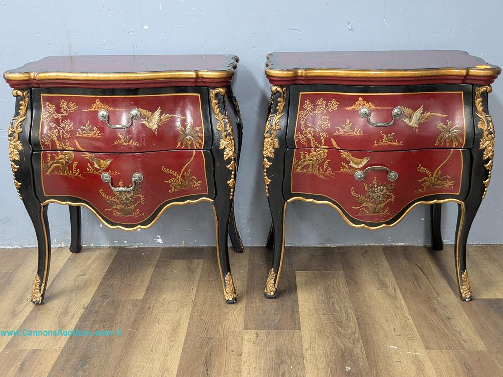 Pair of red and black lacquered Chinoiserie-style two-drawer bombe commodes with gold scenic and floral decoration and cabriole legs.