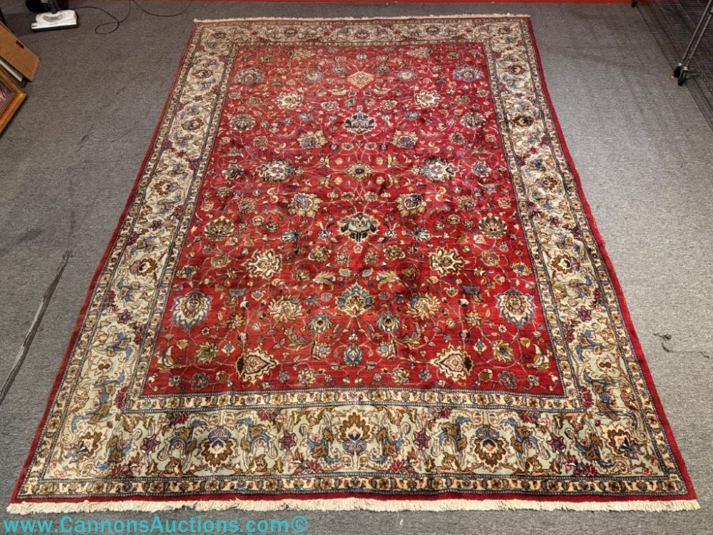 Persian Tabriz hand-knotted wool rug with red field, floral motifs, and ivory border, 112 x 160 inches.