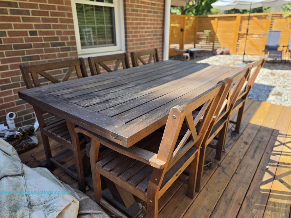 Plow & Hearth wooden outdoor dining table with eight matching armchairs, slatted seats and X-back design, Richmond VA estate auction