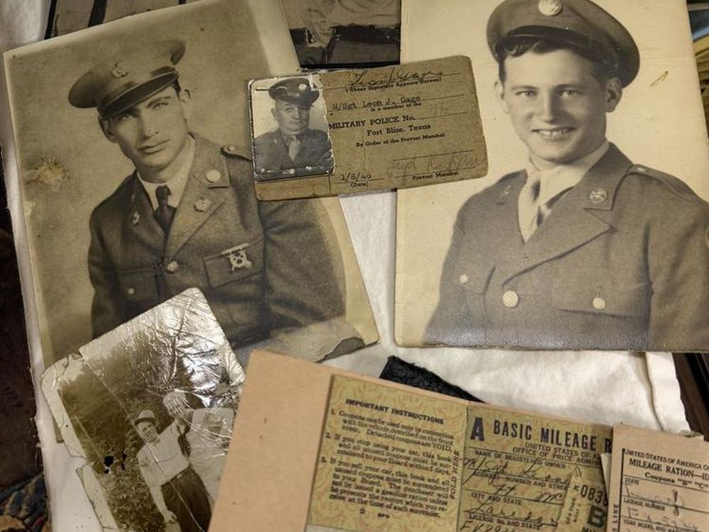 Vintage military photographs and ephemera including uniformed soldier portraits, military identification card, and wartime mileage ration documents.