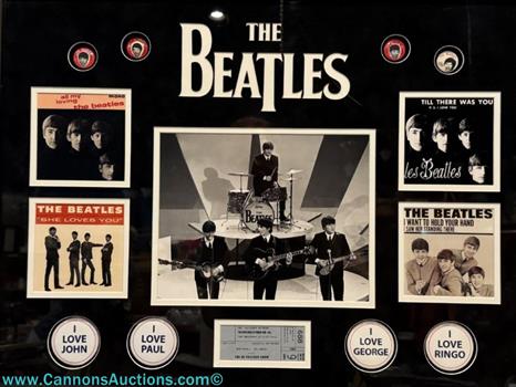 Officially licensed Mounted Memories The Beatles "On The Ed Sullivan Show" framed presentation featuring a black-and-white performance photograph, Beatles album covers, and memorabilia. Acorn Estate Liquidators online auction, Orange VA, October 22, 2026.