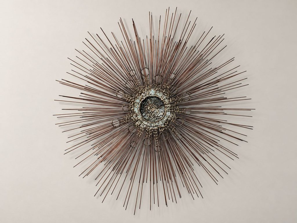 Vintage Mid-Century Modern Brutalist sunburst metal wall sculpture in the style of Curtis Jere, circa 1960s–1970s, 40 inches in diameter.