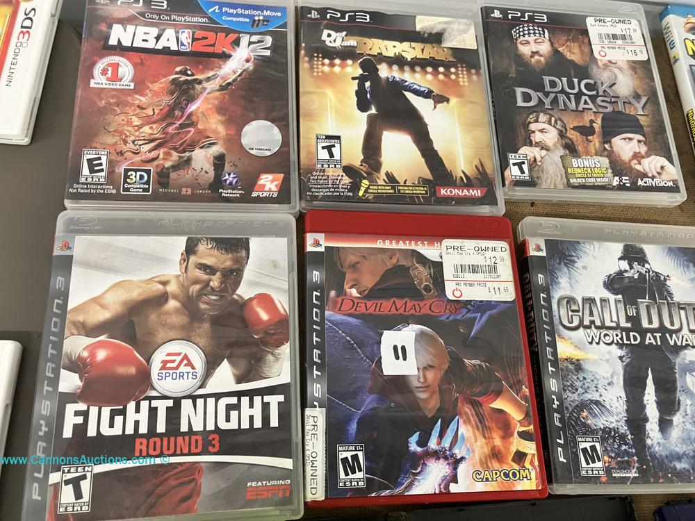 Six Sony PlayStation 3 video games, including NBA 2K12, Def Jam Rapstar, Duck Dynasty, Fight Night Round 3, Devil May Cry 4, and Call of Duty World at War, featured in Cannon's Richmond VA gaming auction.